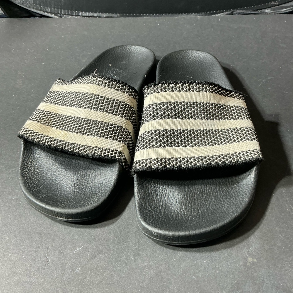 Black and white Adidas sandal